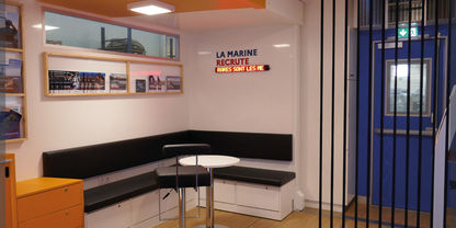 Recruitment area inside the podium bus of the French Navy