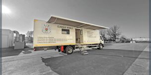 An outdoor blind installed for the comfort of patients waiting for their consultation