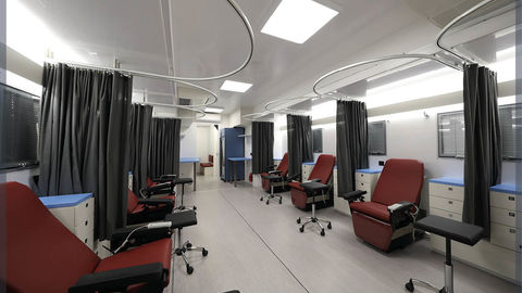 Large blood collection room with 8 electric beds